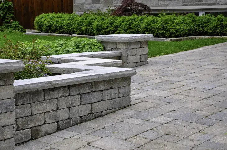 Custom railing installation by Evo Interlocking